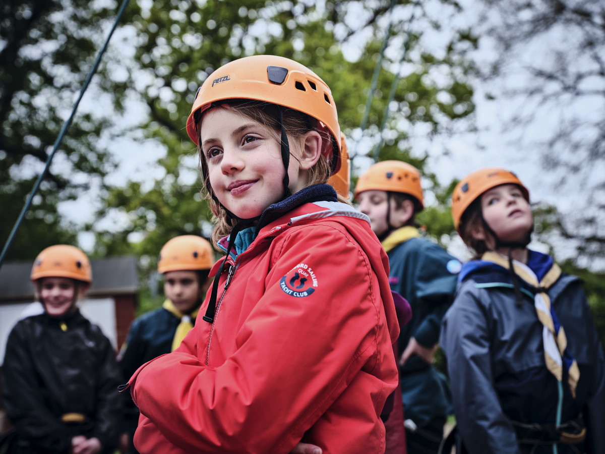 Image of Scouts stood wearing helmets